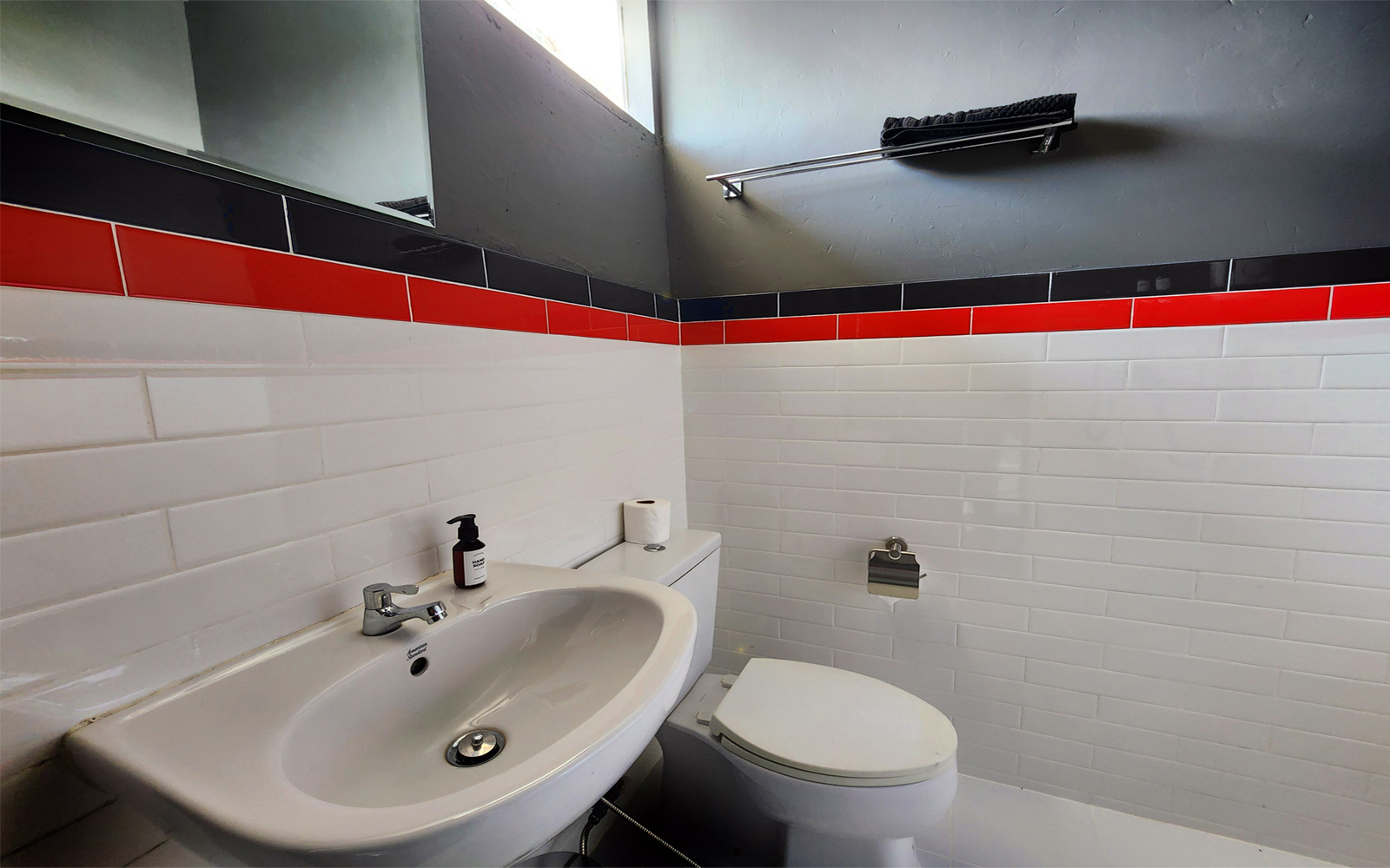 Part luxury room, part Muay Thai dojo, this cinematic set combines comfort and action with a full gym with usable equipment along with a supremely comfortable king bed, private bath, and streaming media/gaming server.